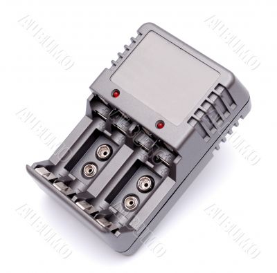 Accu battery charger on a white background Accu battery charger on a white background