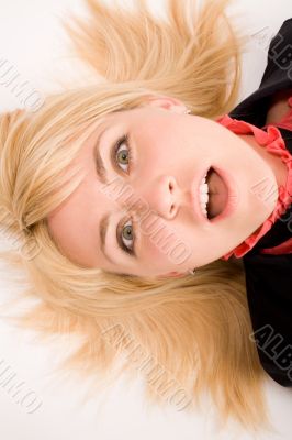 Portrait of astonished blond woman