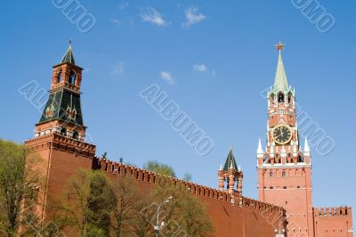 Kremlin wall with a clock in Moscow Kremlin wall with a clock in Moscow