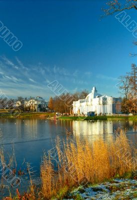 View of iced lake with classical buildings