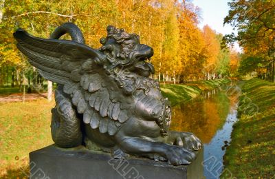 Dragon as a decoration in autumn park