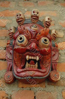 Mahakala mask with crown  with five skulls