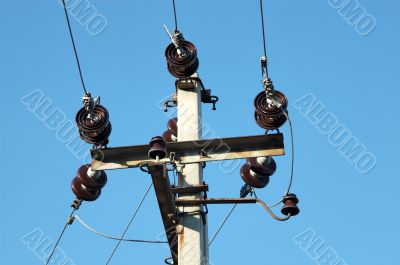 Ferro-concrete column with electric wires.