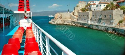 Deck of boat and fortress on the shore