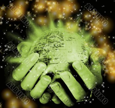 Globe in a girl`s hands