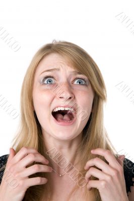 Close up of the face of the scared woman