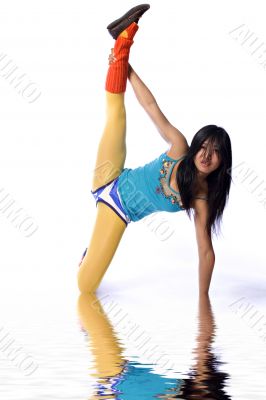 Asian fashion model stretching her leg