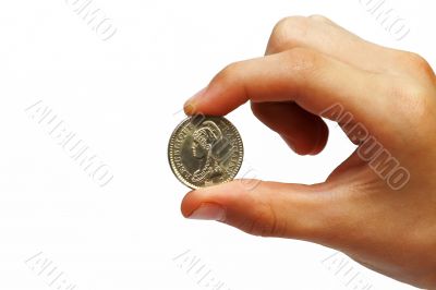 Coin in a man`s hand