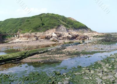 Rock pools by seashore