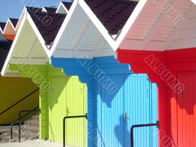 Colorful seaside beach chalets