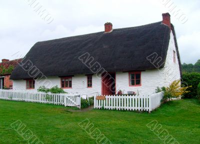 English thatched white cottage English thatched white cottage