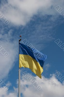Ukrainian state flag upon blue sky Ukrainian state flag upon blue sky