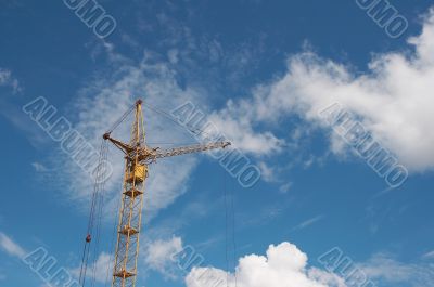 Lifting construction crane at blue sky Lifting construction crane at blue sky