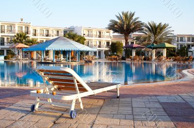 Desk-chair at a pool.