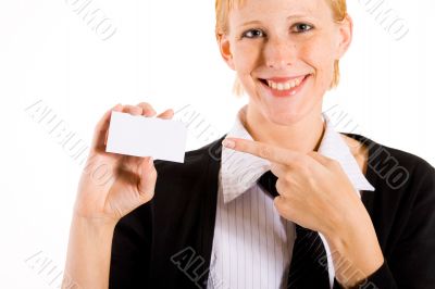 Business woman is pointing to her card