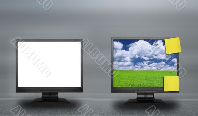 two lcd screens against abstract background