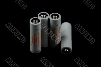 batteries on black background batteries on black background