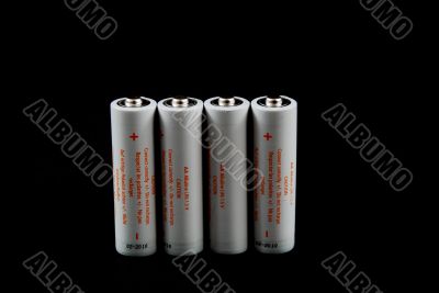 batteries on black background batteries on black background