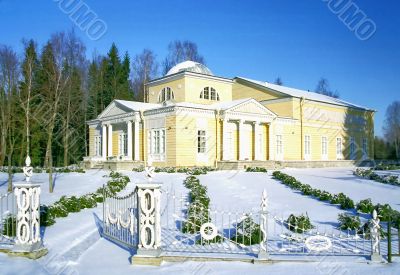 Wooden classical building in winter