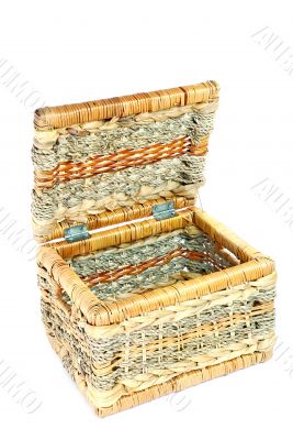 empty brown wicker basket isolated on white background
