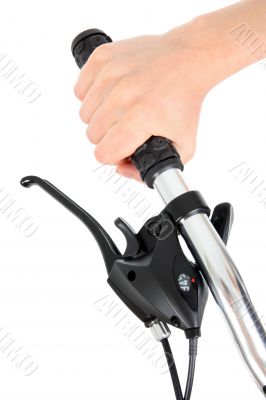 Hand holding bicycle handlebar