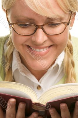 Female With Ponytails Reads Her Book