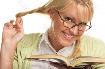 Female With Ponytails Reads Her Book