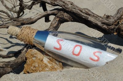 Message in a bottle with SOS signal