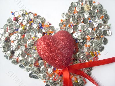 Shining glass beads, spangles and a heart