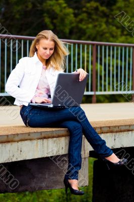 beautiful young lady with notebook