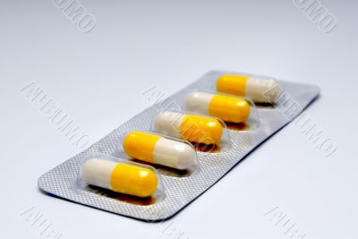 Capsules with a medicine