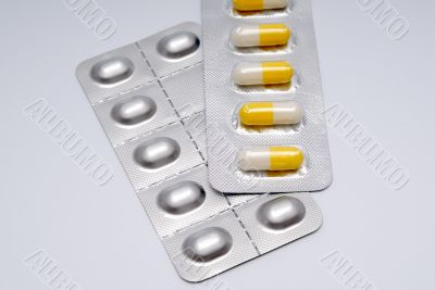 Capsules with a medicine