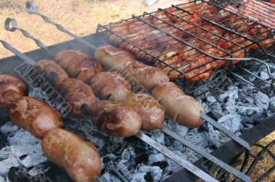 Preparing meat barbecue upon open fire