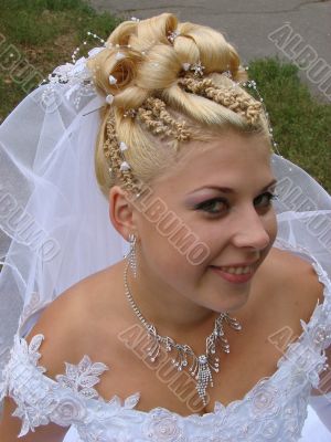 Bride outdoors portrait in wedding day