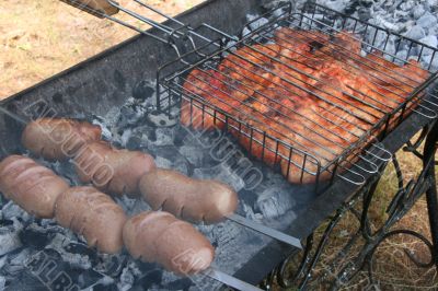 Preparing meat barbecue upon open fire