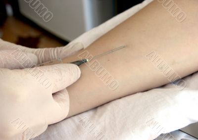 nurse hand with syringe doing injection