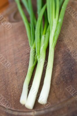 chives on a chopping board chives on a chopping board