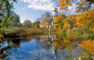Cathedral near the pond in Autumn Cathedral near the pond in Autumn
