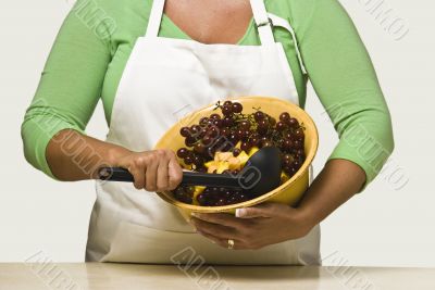 Woman Cook Mixing Fruit