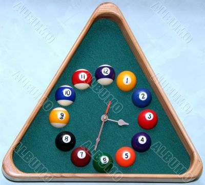 Wall clock in snooker hall in triangle frame shape Wall clock in snooker hall in triangle frame shape