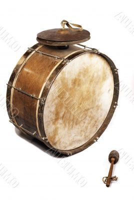 The old, worldly-wise, shabby, dusty bass drum