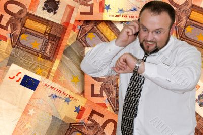  Businessman with a phone on euro background