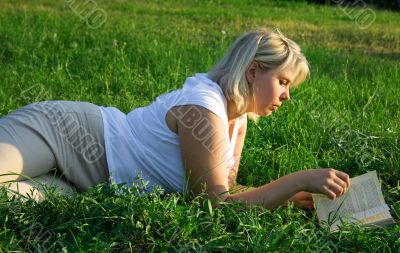 woman reads the book
