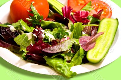 Garden salad with cucumbers and tomatos