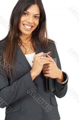 Beautiful brunette woman holding a daybook