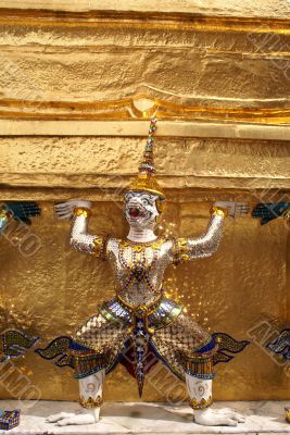 Guard and golden stupa