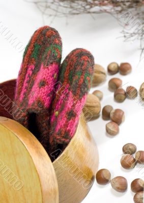 knitted socks in wooden box