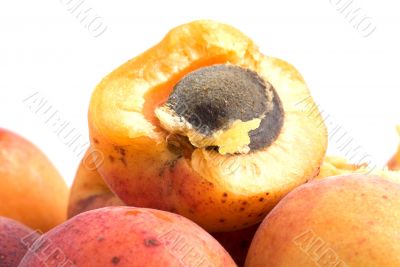 Fresh appetizing apricots on a white background