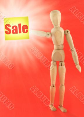 figure holding Sale adhesive note figure holding Sale adhesive note