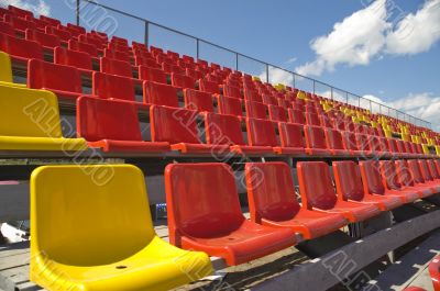 Lines of color seats.